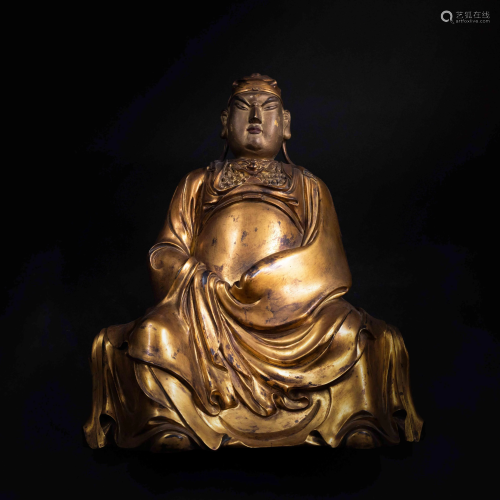 A CHINESE GILDED BRON…