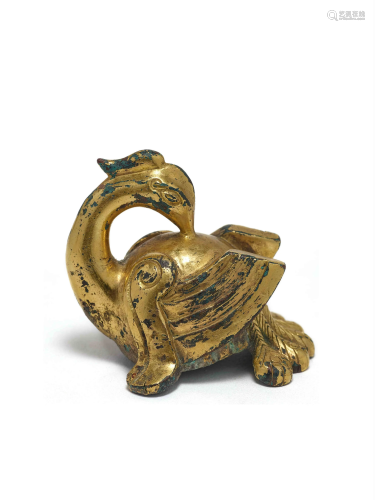A CHINESE GILDED COPPER BIRD ORNAMENT