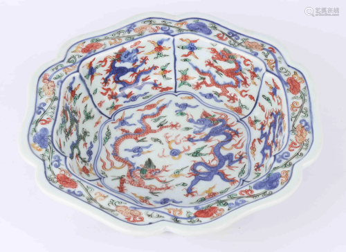 A CHINESE FAMILLE VERTE FLORAL PORCELAIN…