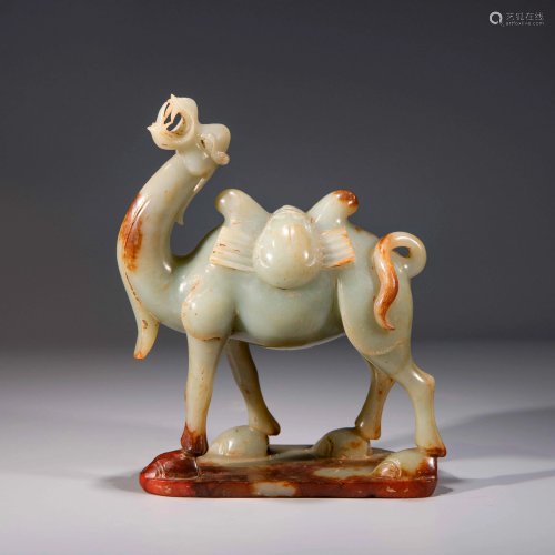 A CHINESE CARVED JADE CAMEL ORNAMENT