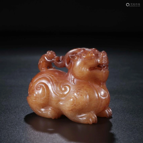 A CHINESE CARVED JADE…
