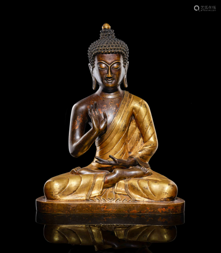 A CHINESE GILDED COPPER STATUE OF SAKY…
