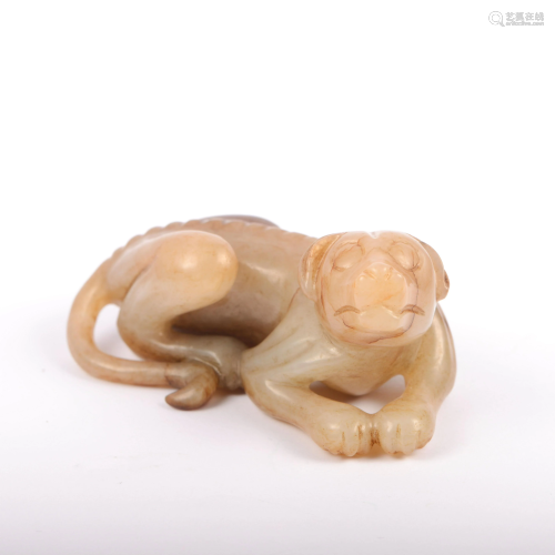 A CHINESE JADE DOG ORNAMENT