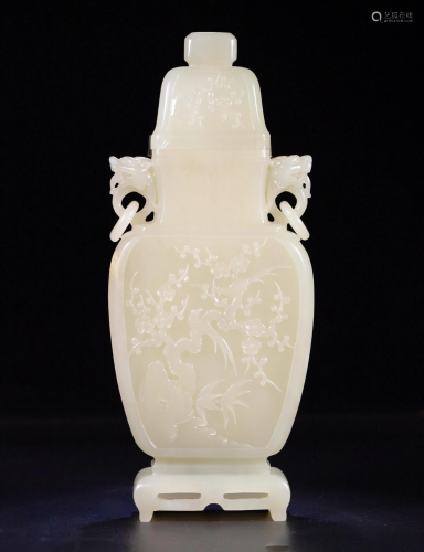 A CHINESE CARVED HETI…