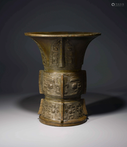 A CHINESE BRONZE WINE CONTAINER