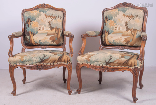 Pair Louis XV style walnut carved armchairs