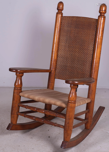 Maple woven back rocking chair