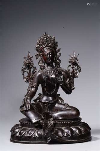A Chinese Carved Rosewood Tara Seated Statue