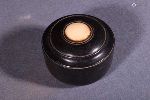 A Chinese Round Rosewood Box With Cover