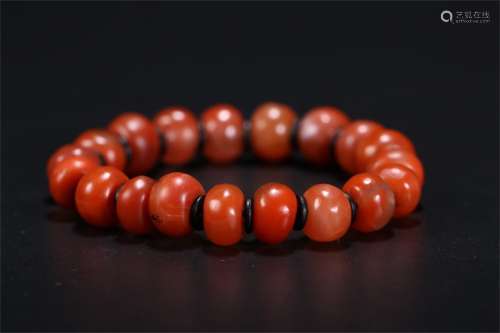 A Chinese South Red Agate Hand String