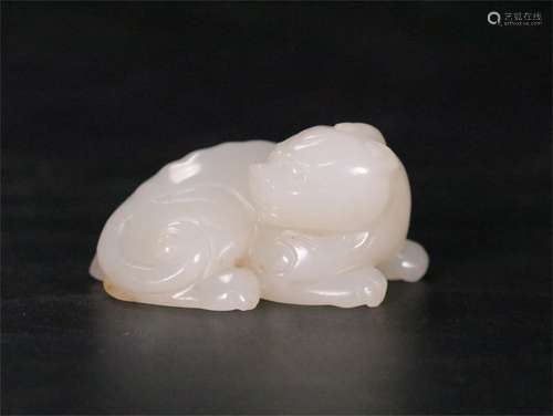 A Chinese Carved Hetian Jade Beast Ornament