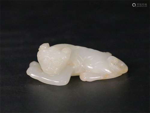 A Chinese Carved Hetian Jade Beast Ornament