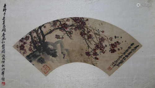 A CHINESE SCROLL PAINTING FAN OF FLOWER WITH CALLIGRAPHY BY WU CHANGSHUO