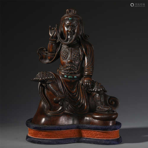 A CHINESE AGALWOOD CARVED SEATED GUANGONG