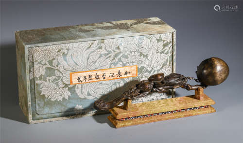 A CHINESE AGALWOOD CARVED RUYI AND MACHING BOX