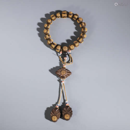 A CHINESE ROSEWOOD GILT INLAID CARVED BEAD BEAD BUDDHIST BRACELET