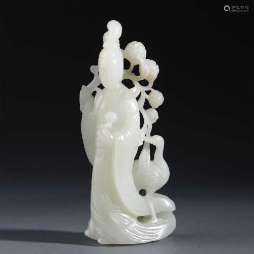 A CHINESE HEITAN WHITE JADE CARVED STAND GUANYIN