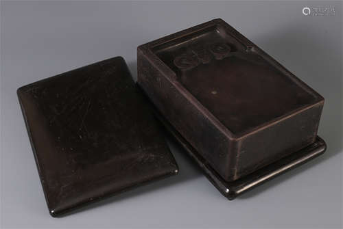 A CHINESE RECTANGULAR INKSTONE