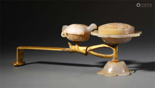 A CHINESE GILT BRONZE INLAID JADE CARVED CANDLE HOLDER