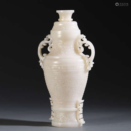 A CHINESE HETIAN WHITE JADE CARVED DOUBLE HANDLD LIDDED VASE