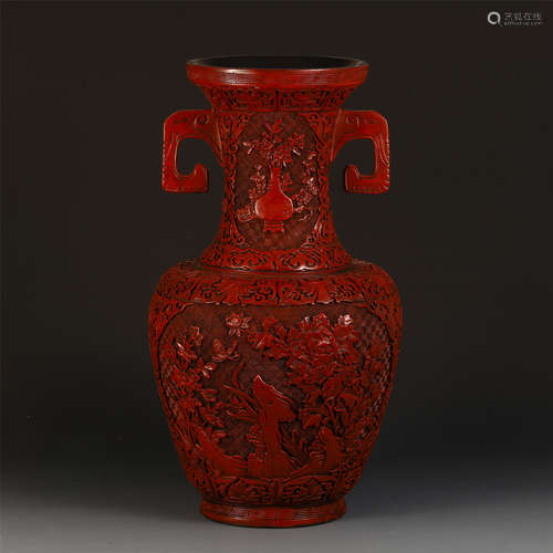 A CHINESE CINNABAR CARVED FLOWER DOUBLE HANDLE VASE