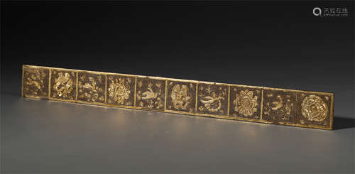 A CHINESE GILT SILVER FOWER AND BIRD RULER