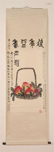 A CHINESE CALLIGRAPHIC PAINTING SCROLL OF PEACHES BY QI BAISHI