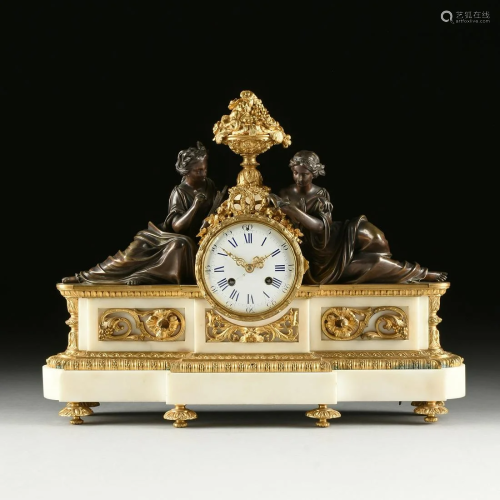 A LOUIS XVI STYLE GILT AND PATINATED BRO…