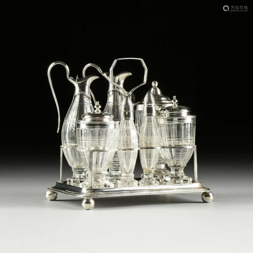 A GEORGE III SILVER CRUET STAND AND SEVE…