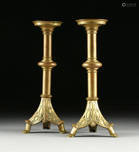 A PAIR OF NEO-GOTHIC BRONZE CANDL…