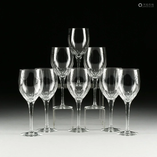 A SET OF EIGHT CUT CRYSTAL WINE GLAS…