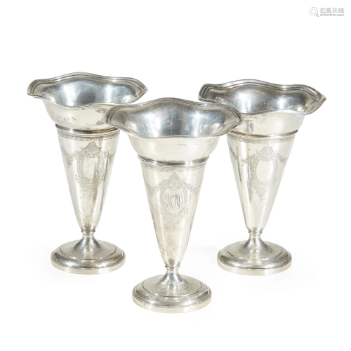 Three sterling silver weighted base vases, 19t…
