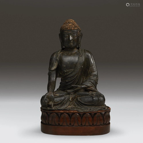 A Chinese bronze figure of Buddha, Ming d…