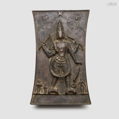 An Indian bronze shield-form plaque depicting