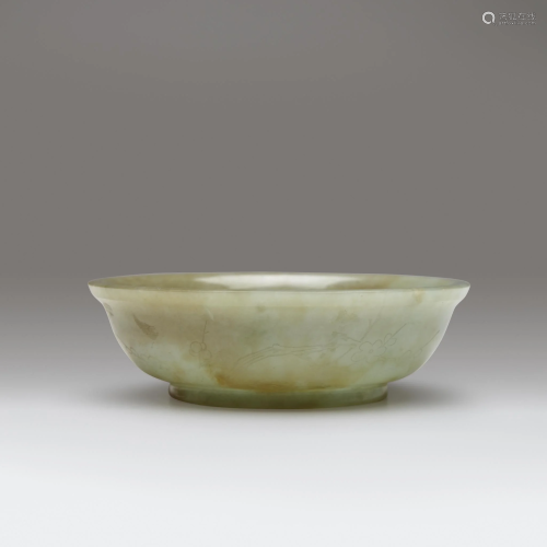 A Chinese carved jadeite small bowl, 18th/…
