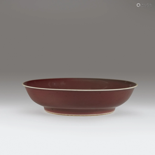 A Chinese copper red-glazed porcelain dish,…