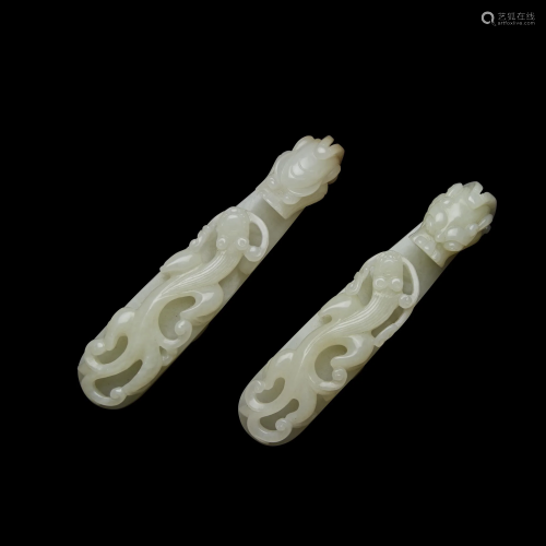 Two similar Chinese carved white jade beltho…