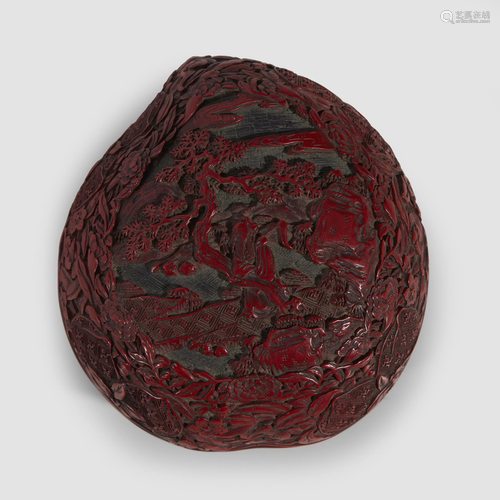 A Chinese finely-carved cinnabar lacquer …