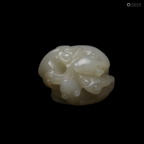 A small Chinese carved white jade 