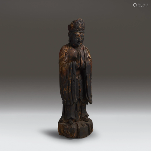 A Chinese carved and gilt-laquered figure …