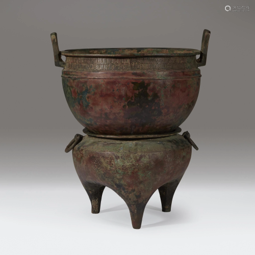 A Chinese archaic bronze steamer and assoc…