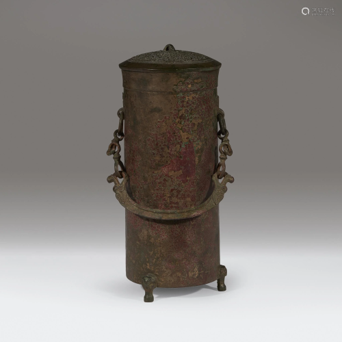 A Chinese archaic bronze cylindrical covere…