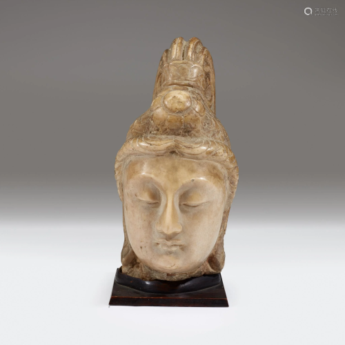 A Chinese carved stone head of bodhisattv…