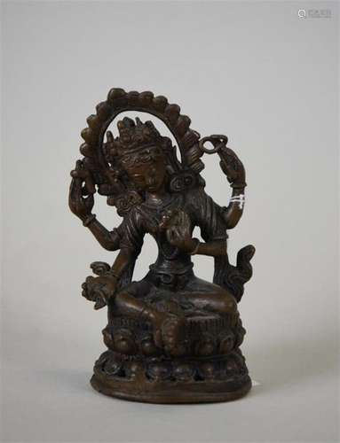 TIBET XXe siècle Statuette de divinité en bronze p…