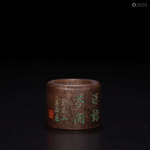 A Chinese Inscribed Eaglewood Thumb Ring