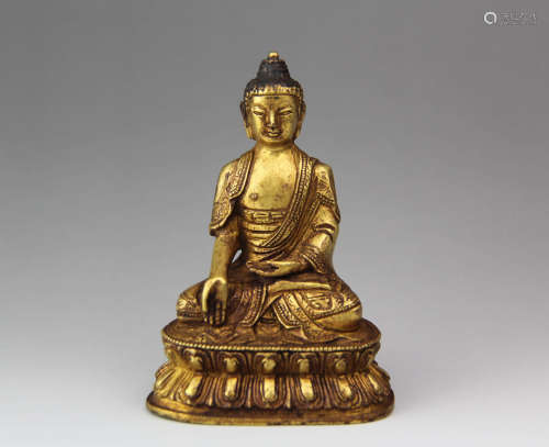 A Chinese Gilded Bronze Statue of Sakyamuni