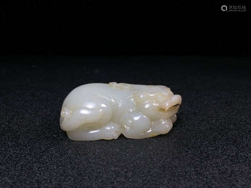 A Chinese Hetian Yellow Jade Beast Pendant