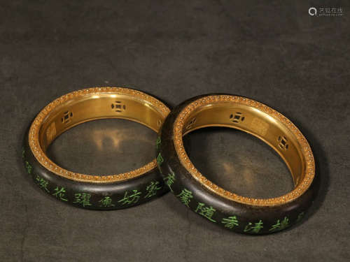 A Pair of Chinese Gilded Inscribed Eaglewood Bracelet