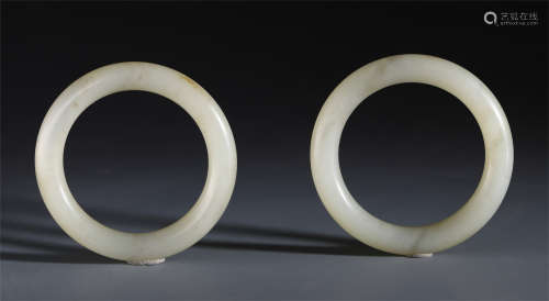 A PAIR OF CHINESE JADE CARVED BANGLE