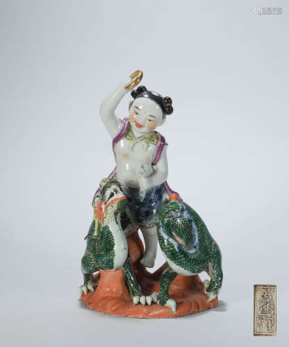 A Statue of NeZha holding a Dragon from Qing